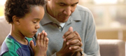 dad and son praying